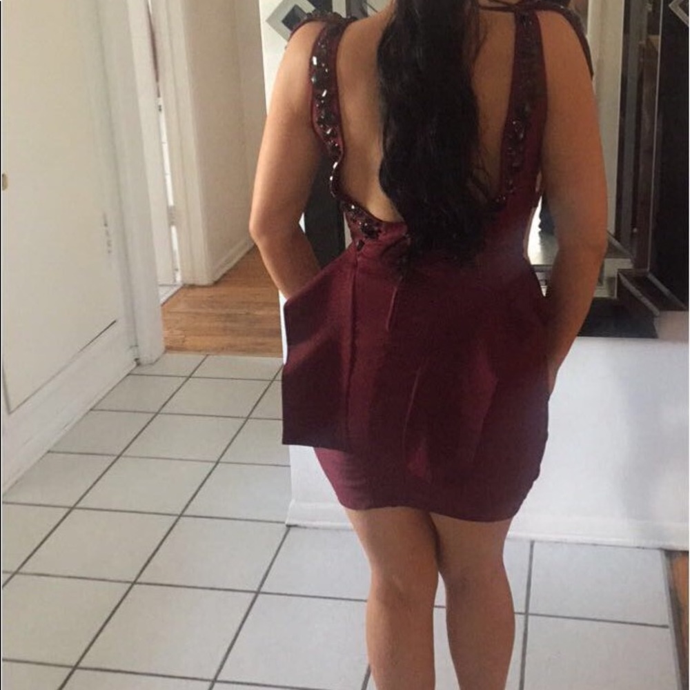 Cap sleeve studded peplum dress with open back